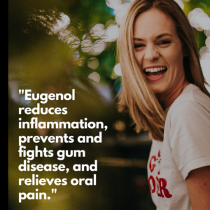 A woman smiling, revealing white teeth and healthy gums that are bacteria-free thanks to cannabis terpenes like eugenol.