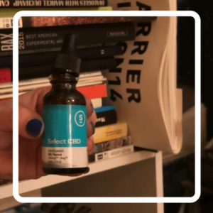 The author's photo shows a bottle of SelectCBD Drops.